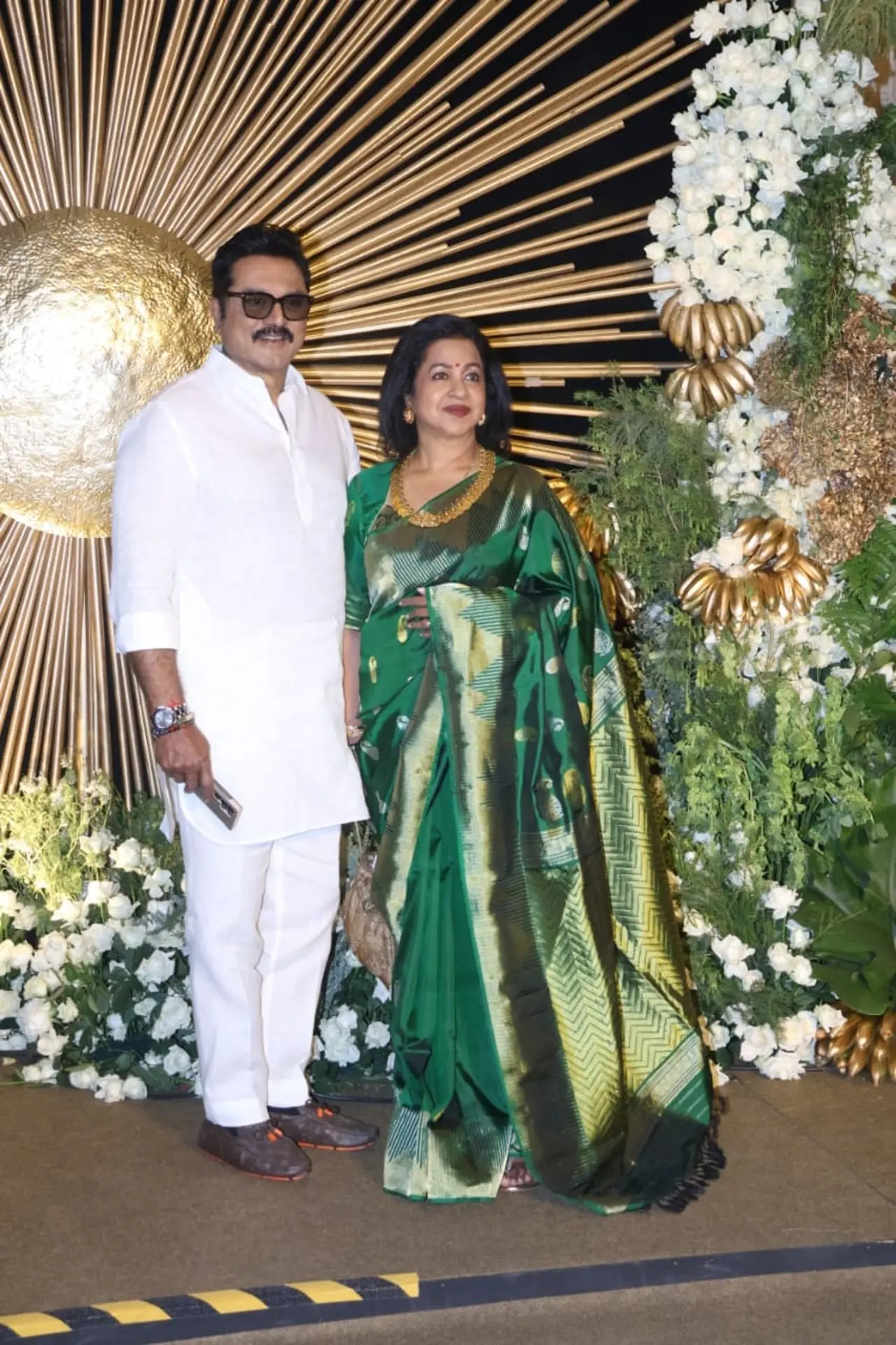 R. Sarathkumar looked graceful in an all-white kurta, exuding understated elegance at the event. By his side, Radhika Sarathkumar stunned in a rich green saree, adding a vibrant touch to the evening.